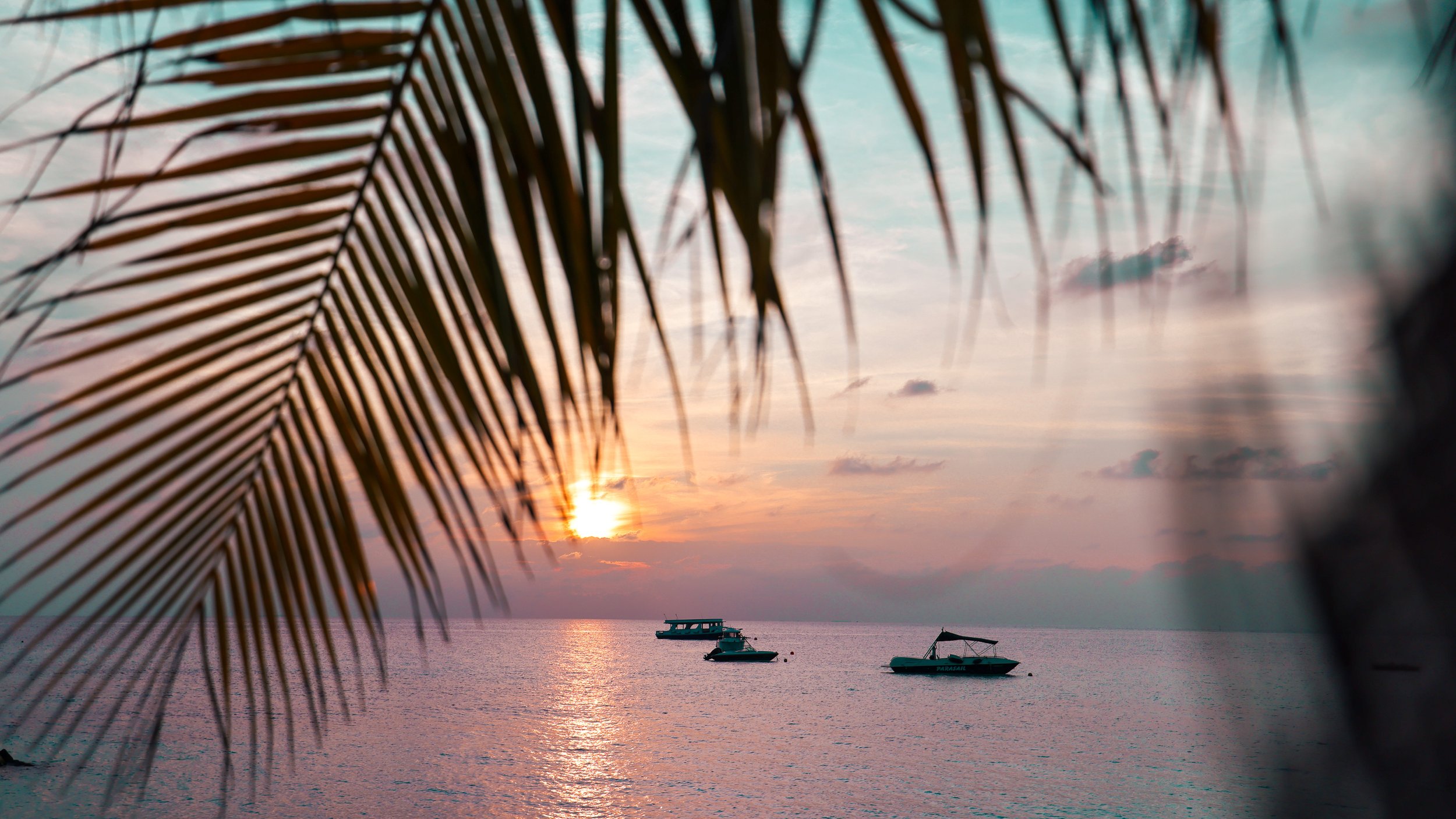 Sunset from behind the private Beach Villa at the JW Marriott Maldives